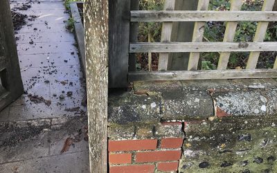Repair to gate and wall